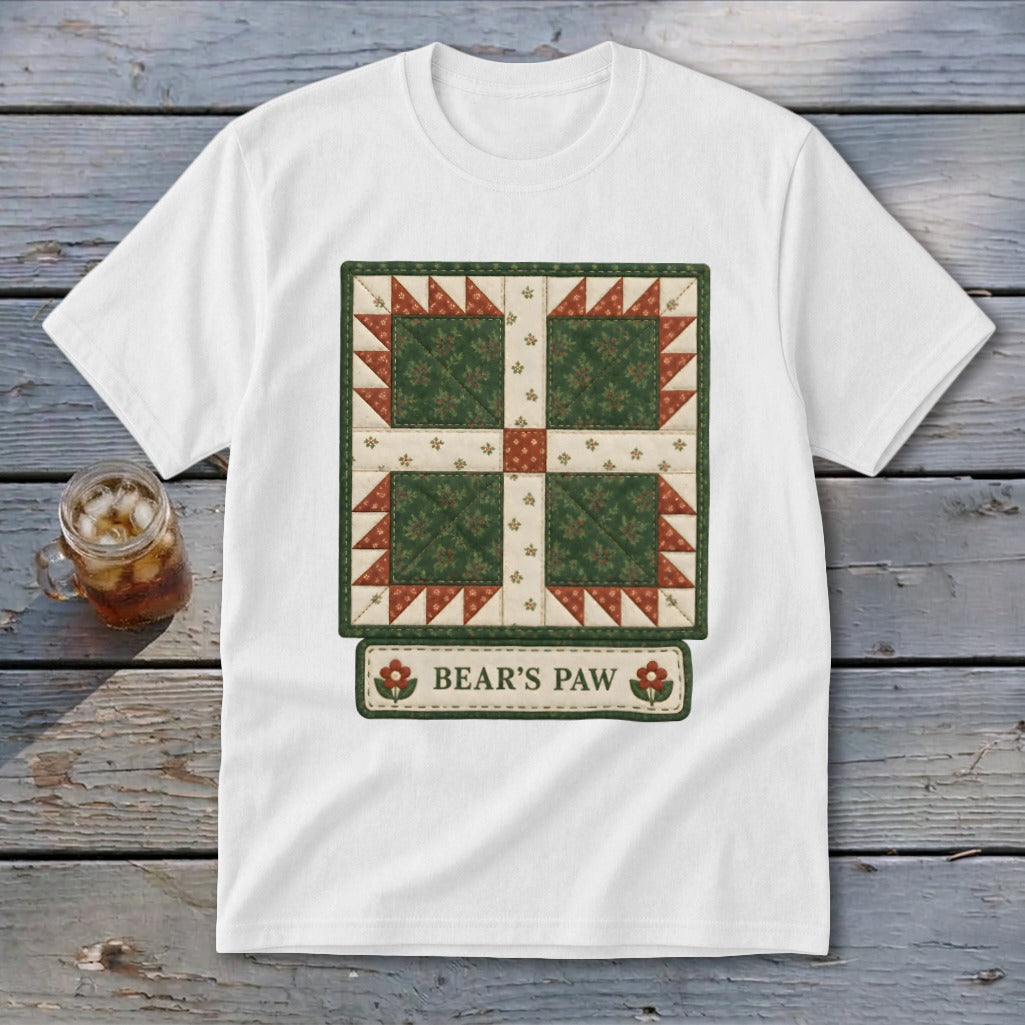 White t-shirt featuring a traditional quilt block design with "Bear's Paw" text.