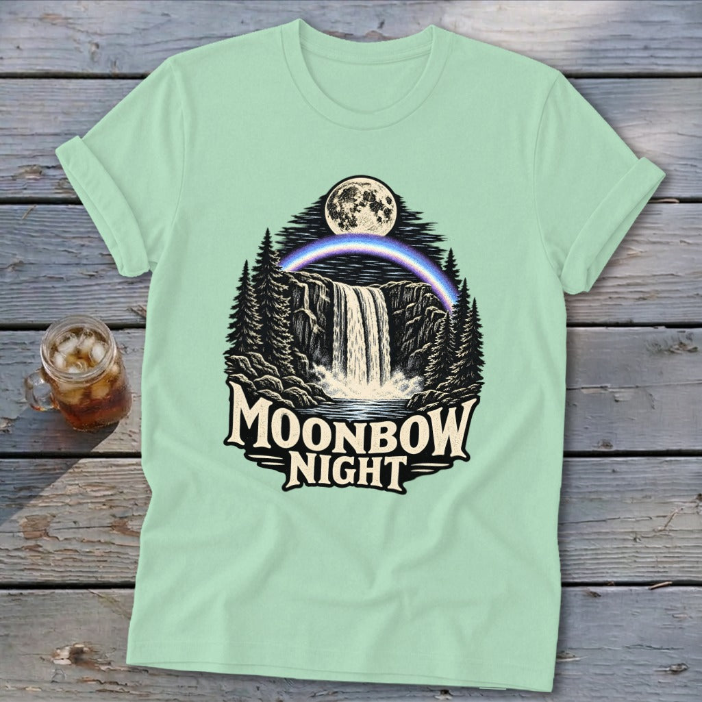 T-shirt graphic of a moonbow over a waterfall with "Moonbow Night" text.