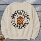 Cream sweatshirt with a circular "Apple Butter Festival" graphic featuring a kettle over a fire.