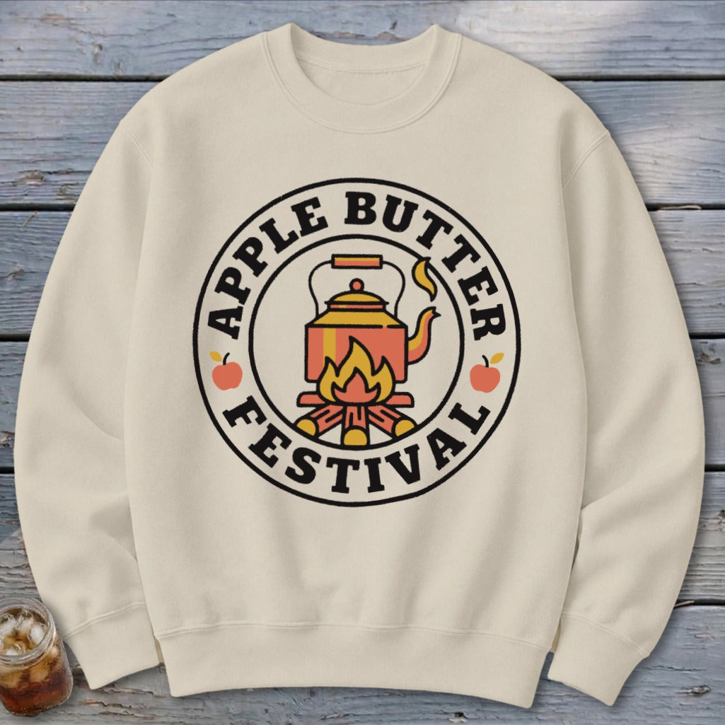 Cream sweatshirt with a circular "Apple Butter Festival" graphic featuring a kettle over a fire.