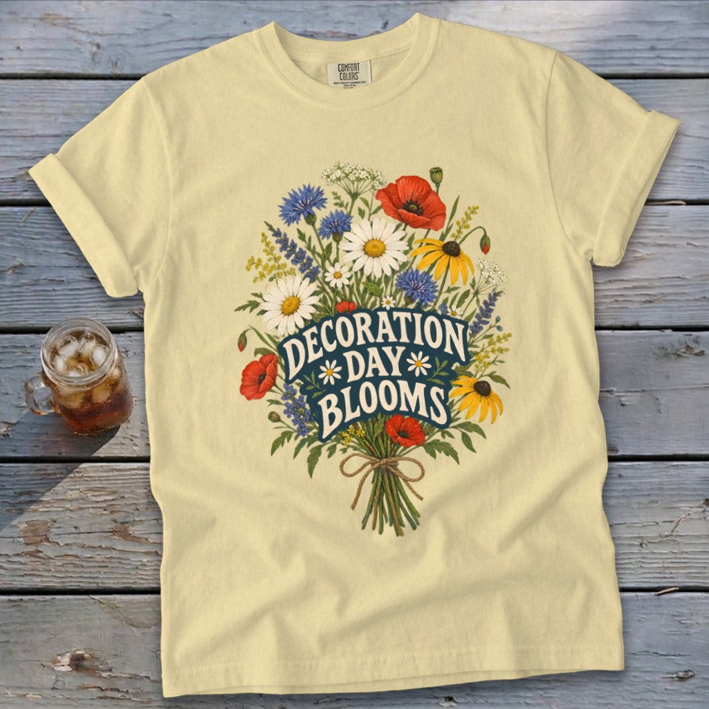 Light yellow t-shirt with floral graphic and "DECORATION DAY BLOOMS" text.