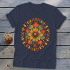 Navy t-shirt with a circular autumn leaf and acorn mandala design.