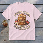 Pink t-shirt with "Dried Apple Stack Cake" graphic featuring a layered cake and apples.