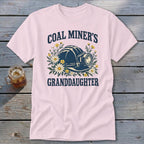 Pink t-shirt with "Coal Miner's Granddaughter" text and a miner's helmet with flowers.