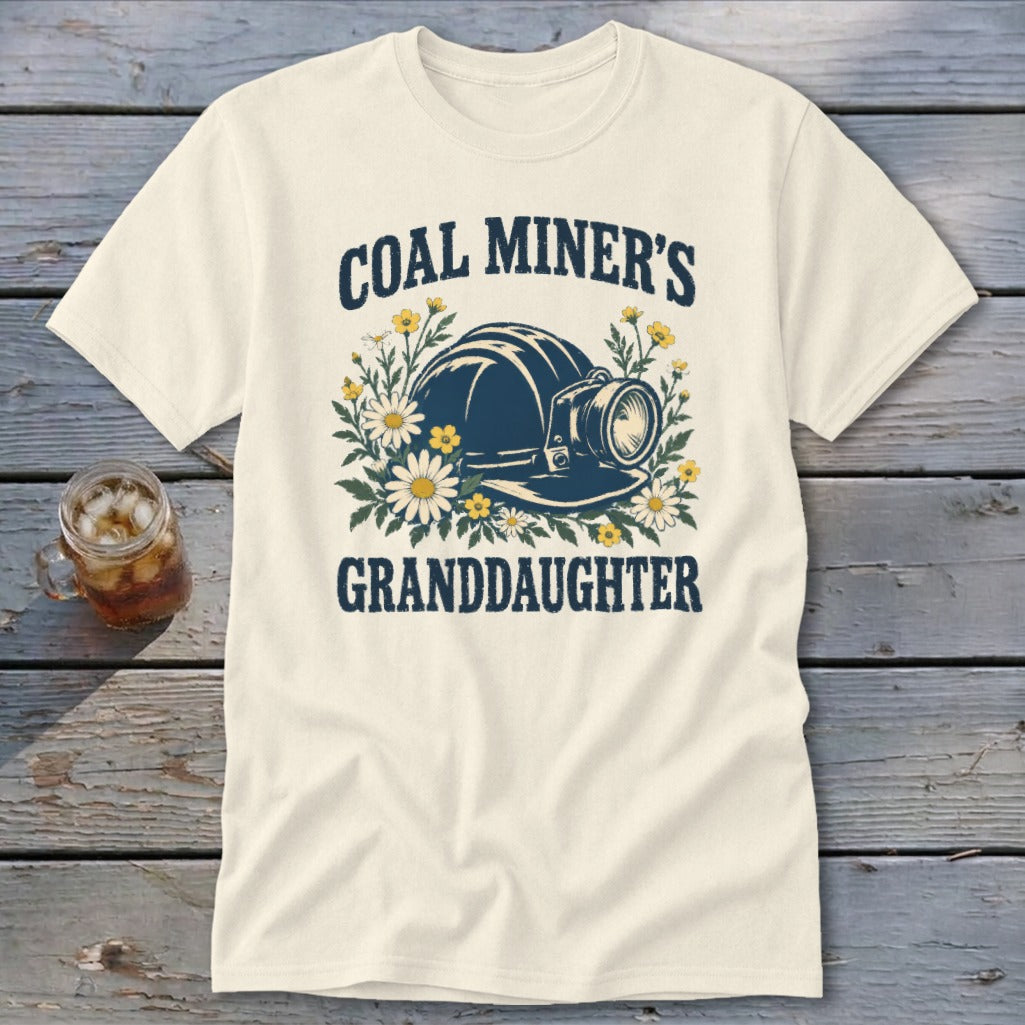 Cream t-shirt with "Coal Miner's Granddaughter" text and mining helmet with flowers.