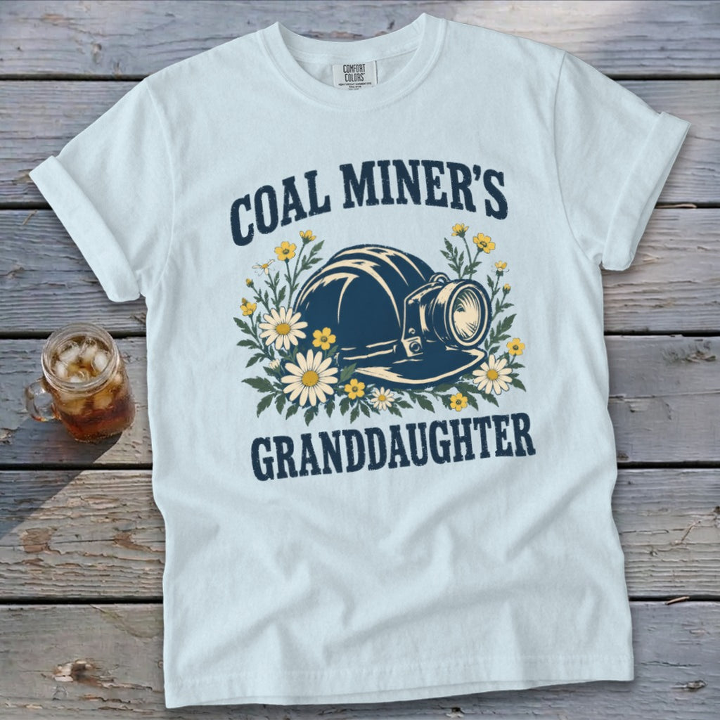 Light blue t-shirt with "Coal Miner's Granddaughter" text and a miner's helmet graphic.