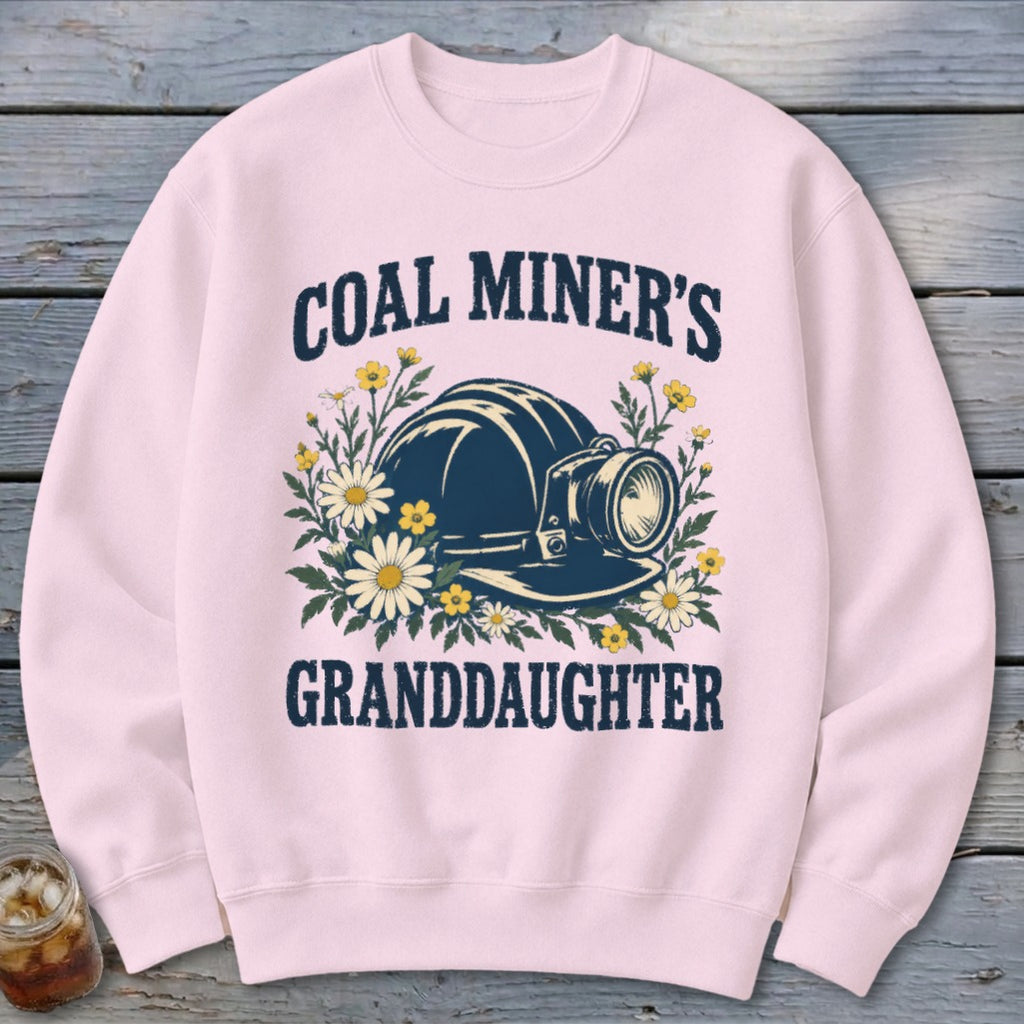 Pink sweatshirt with "Coal Miner's Granddaughter" text and a miner's helmet graphic.
