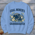 Blue sweatshirt with "Coal Miner's Granddaughter" text and miner's helmet surrounded by flowers.