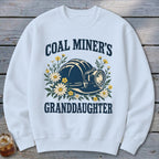 White sweatshirt with "Coal Miner's Granddaughter" text and mining helmet graphic.