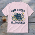 Light pink t-shirt with "Coal Miner's Granddaughter" text and a coal miner's helmet with flowers.