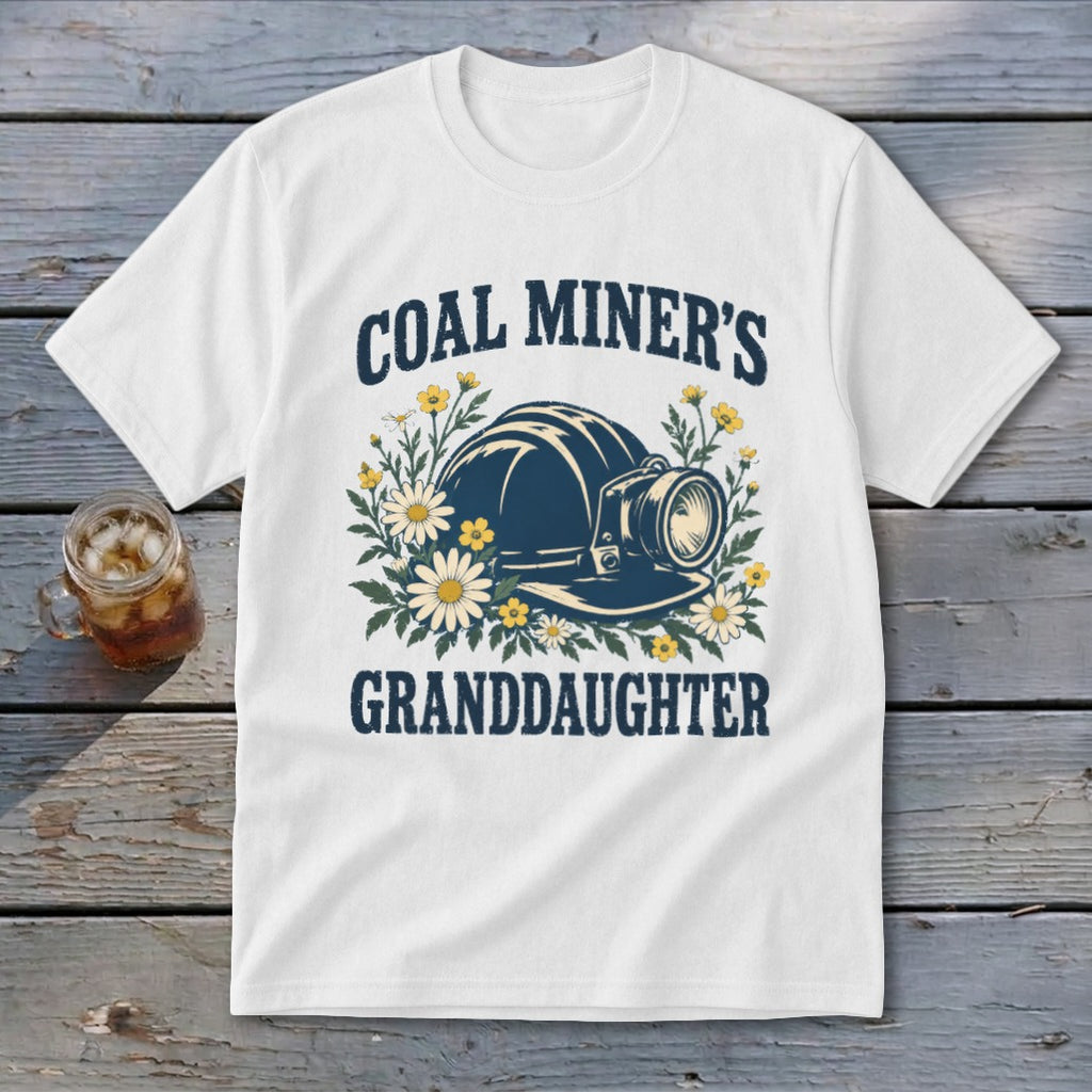 White t-shirt with "Coal Miner's Granddaughter" and a hard hat surrounded by flowers.