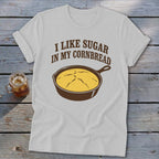 White t-shirt with "I Like Sugar In My Cornbread" and a skillet of cornbread.