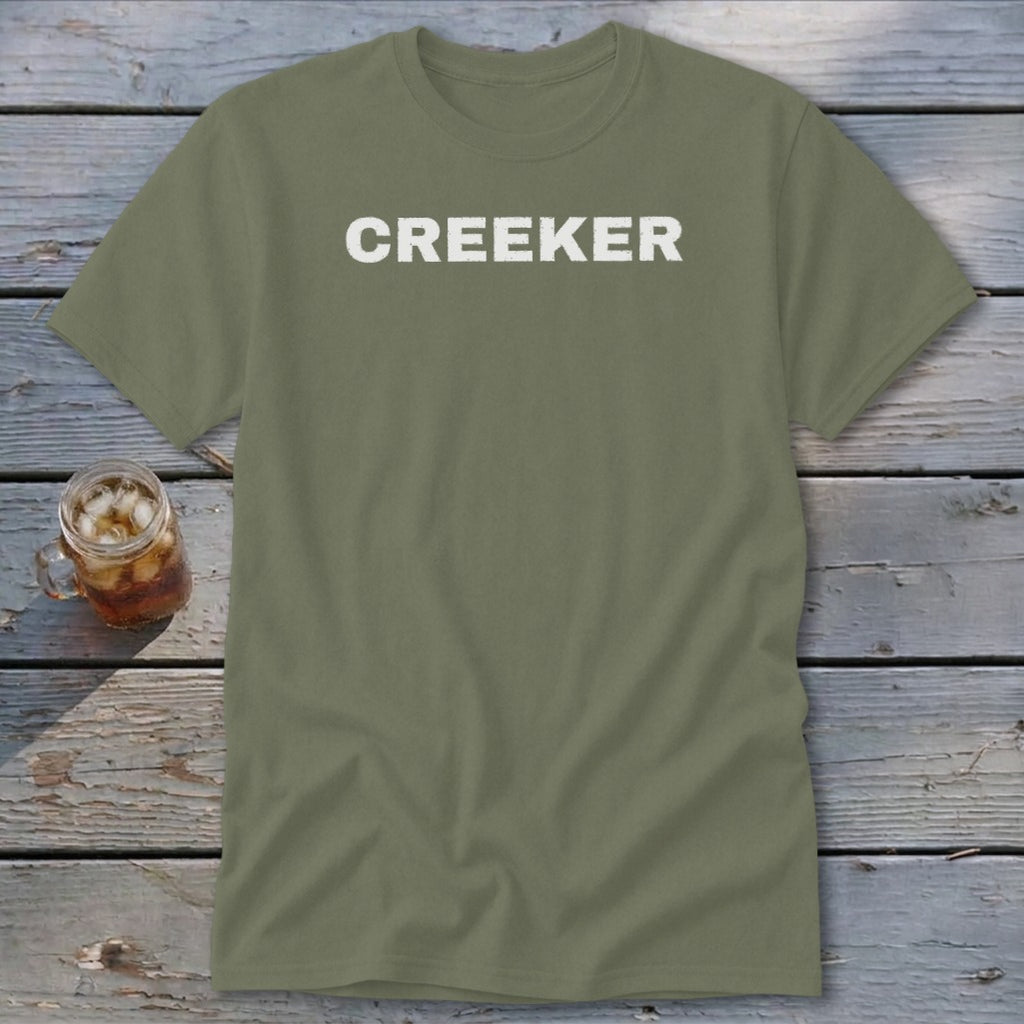 Olive green t-shirt with "CREEKER" printed in white on the chest.