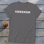 Grey t-shirt with "CREEKER" printed in white on the chest.