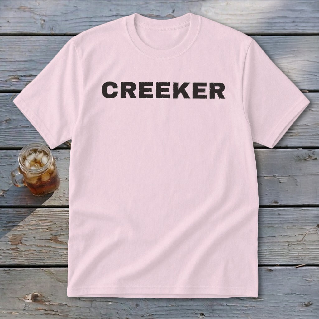 Light pink t-shirt with "CREEKER" in black distressed letters.