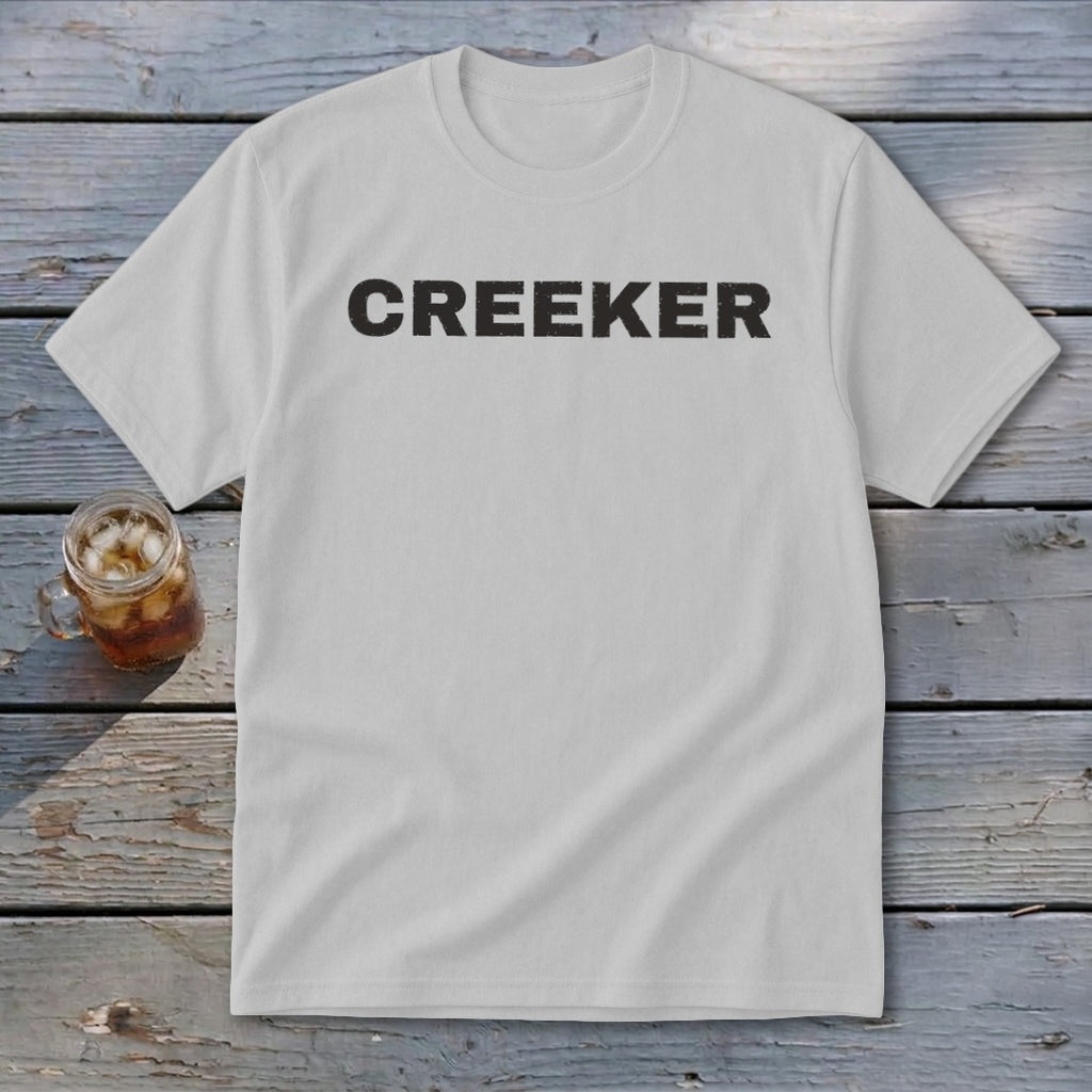 White t-shirt with "CREEKER" printed in black text.