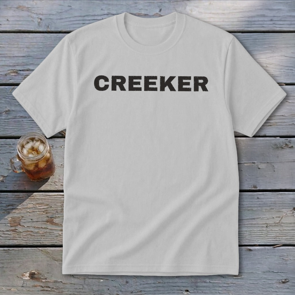 White t-shirt with "CREEKER" printed in black text.