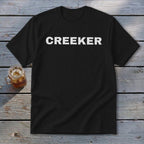 Black t-shirt with "CREEKER" in white distressed lettering.