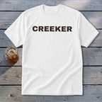White t-shirt with "CREEKER" printed in black text.