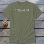 Olive green t-shirt with white text "didjaeatyet" and a glass of iced tea.