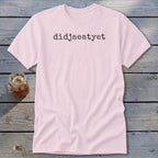 Pink t-shirt with black text "didjaeatyet" and a glass of iced tea.