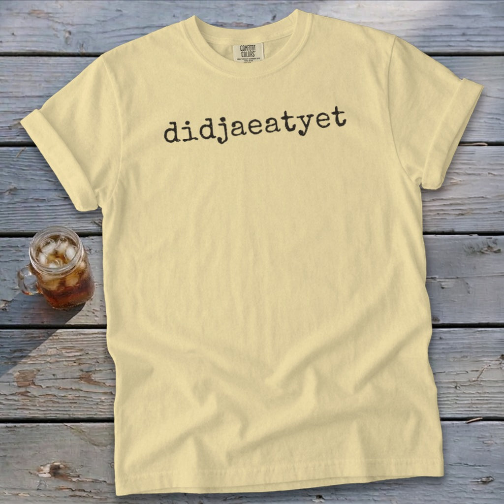 Light yellow t-shirt with black text that reads "didjaeatyet."