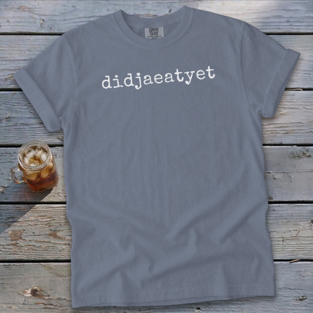 Gray t-shirt with white text "didjaeatyet" and a glass of iced tea.