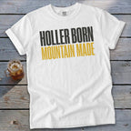 White t-shirt with "HOLLER BORN MOUNTAIN MADE" text.