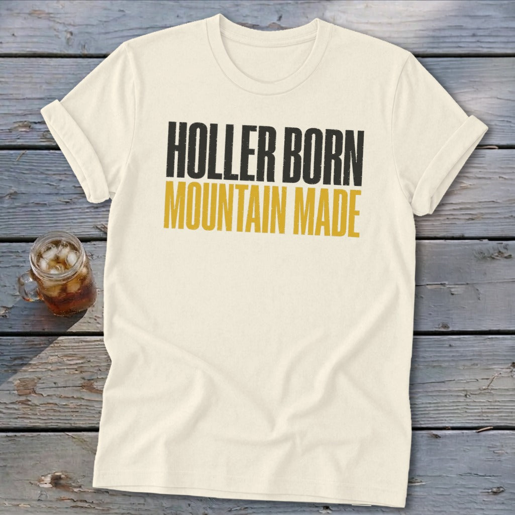 Cream t-shirt with black and yellow text "HOLLER BORN MOUNTAIN MADE".