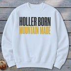 White sweatshirt with black and yellow text reading "Holler Born Mountain Made".