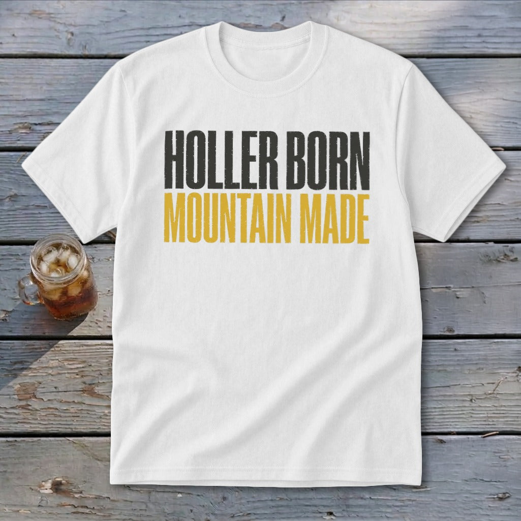 White t-shirt with black and gold text reading "Holler Born Mountain Made."
