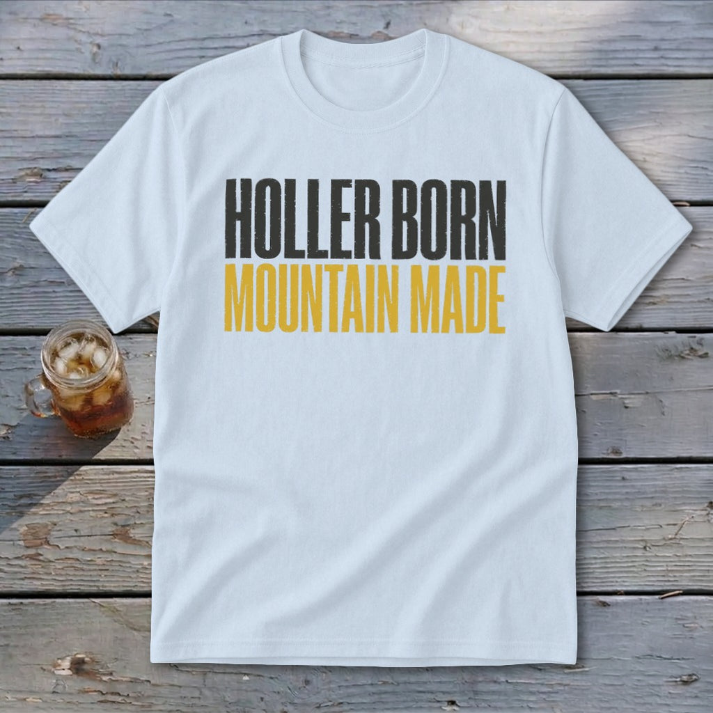 White t-shirt with "Holler Born Mountain Made" text in black and yellow.