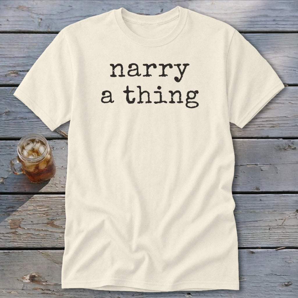 Cream t-shirt with black text reading "narry a thing" and a glass of iced tea.