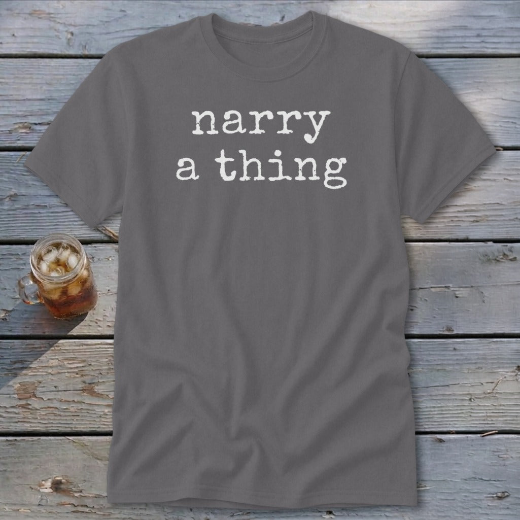 Grey t-shirt with "narry a thing" text, next to a glass of iced tea.