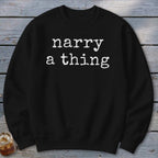 Black sweatshirt with white text that reads "narry a thing".