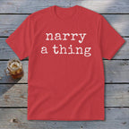 Red t-shirt with white text "narry a thing" and a glass of iced tea.