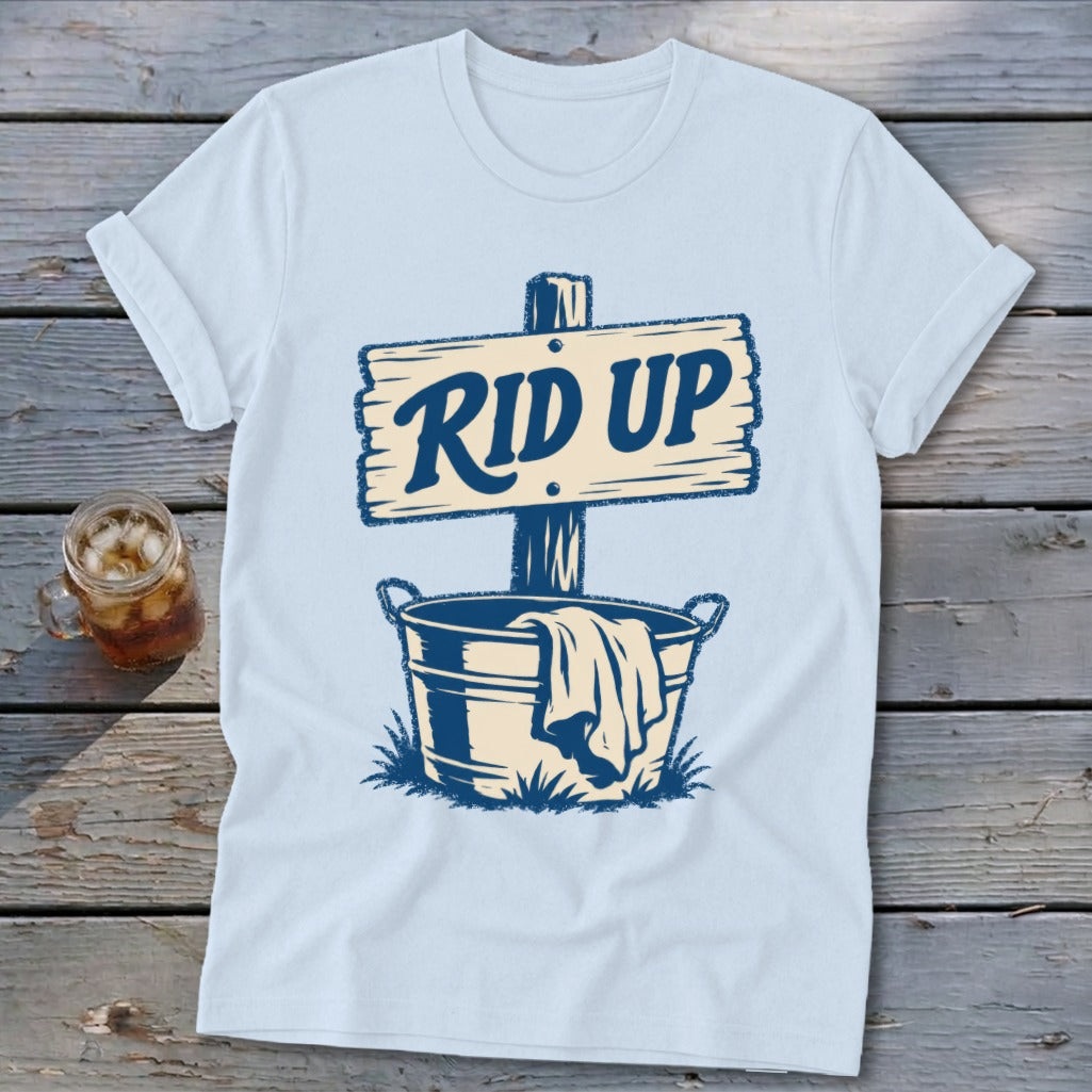 Light blue t-shirt with "RID UP" text on a sign above a bucket.