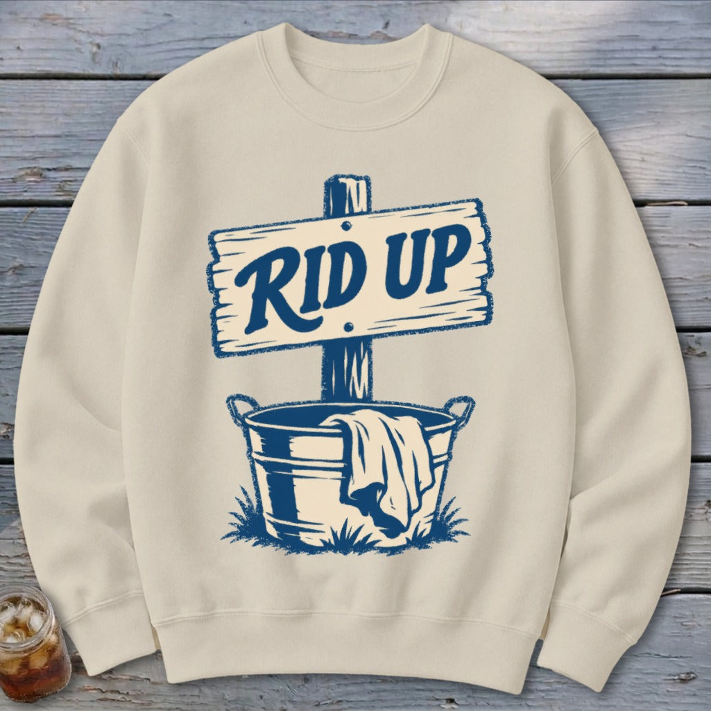 Cream sweatshirt with "RID UP" sign over a wash bucket graphic.
