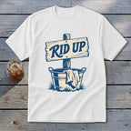 White t-shirt with "RID UP" text on a wooden sign above a bucket.