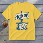 Yellow t-shirt with "RID UP" on a wooden sign above a bucket of laundry.