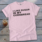 Pink Comfort Colors t-shirt with black text "I LIKE SUGAR IN MY CORNBREAD".
