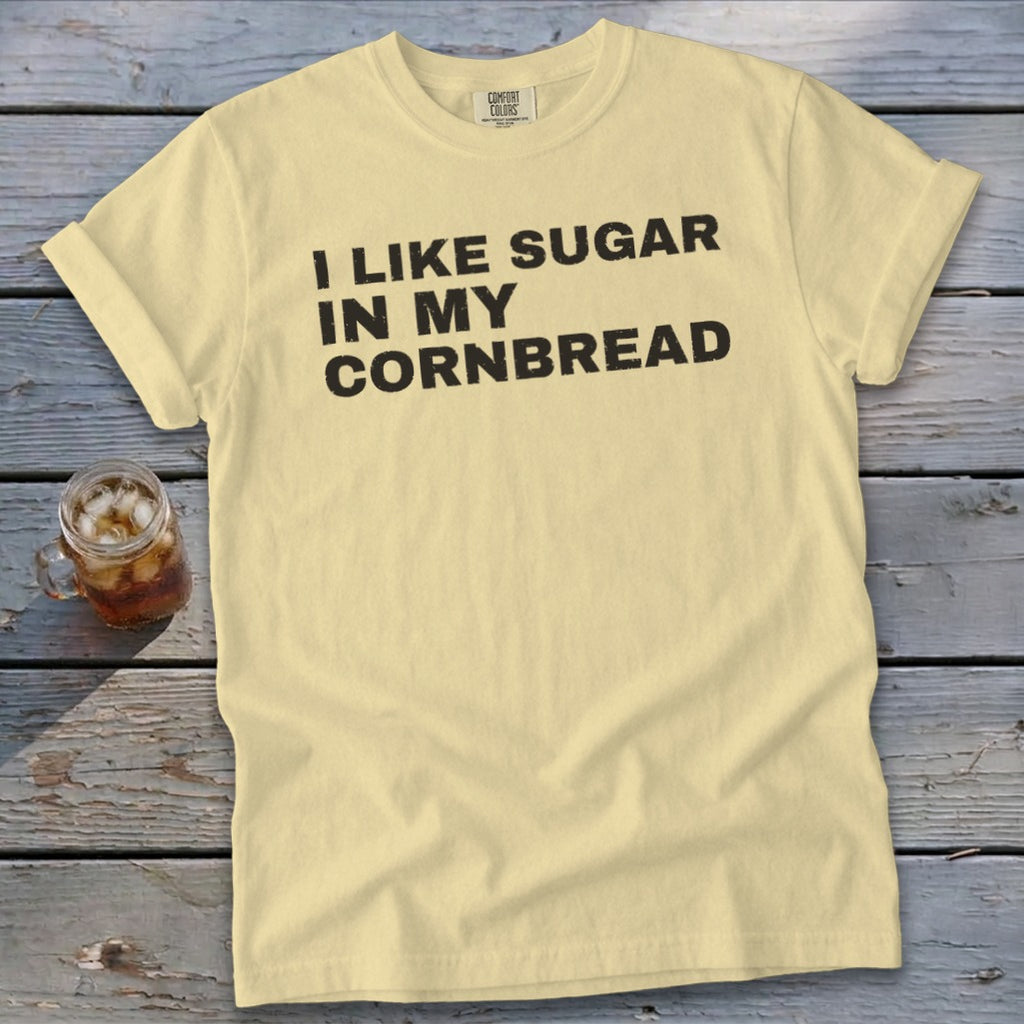 Yellow t-shirt with black text "I LIKE SUGAR IN MY CORNBREAD."