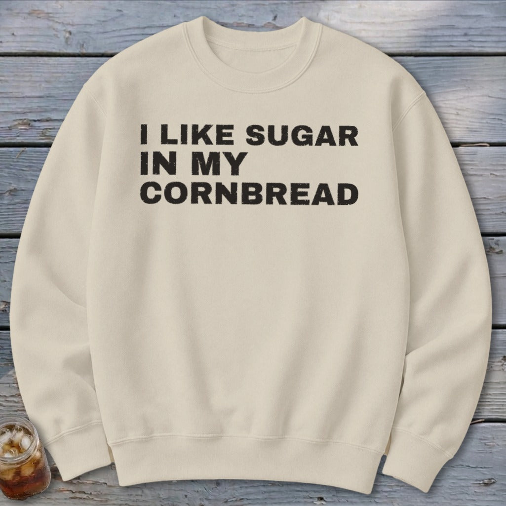 Cream sweatshirt with black text: "I LIKE SUGAR IN MY CORNBREAD".