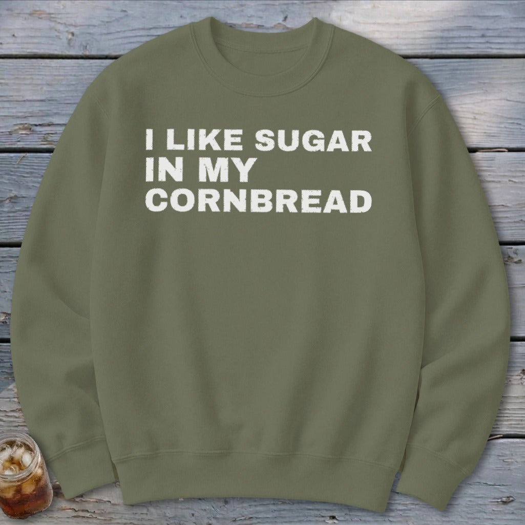 Green sweatshirt with white text "I LIKE SUGAR IN MY CORNBREAD".