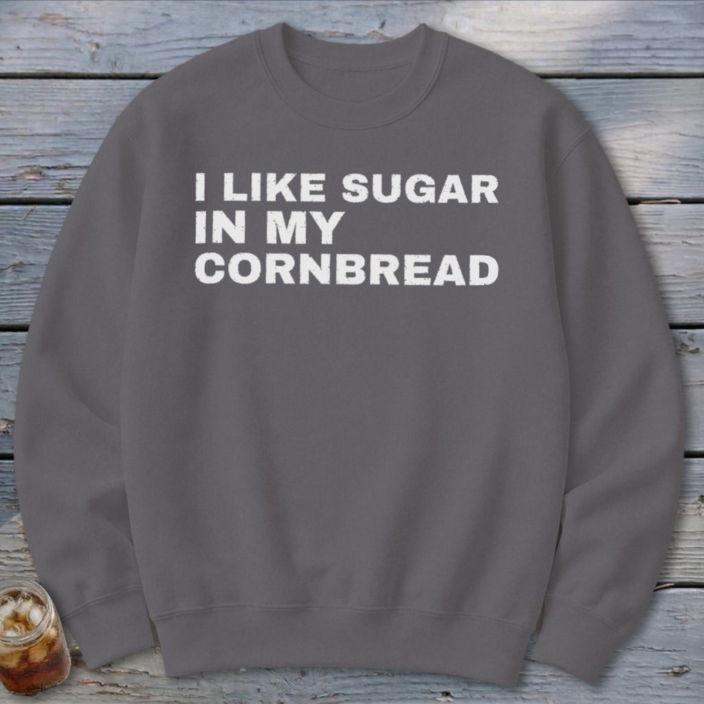 Gray sweatshirt with white text that reads "I LIKE SUGAR IN MY CORNBREAD."