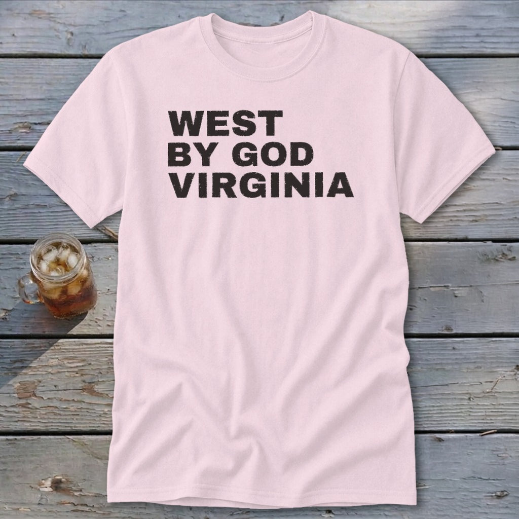 Light pink t-shirt with black text reading "WEST BY GOD VIRGINIA".