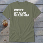 Olive green t-shirt with "WEST BY GOD VIRGINIA" printed in white distressed text.