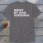 Grey t-shirt with white text reading "WEST BY GOD VIRGINIA" and a drink.