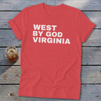 Coral t-shirt with white text "WEST BY GOD VIRGINIA".