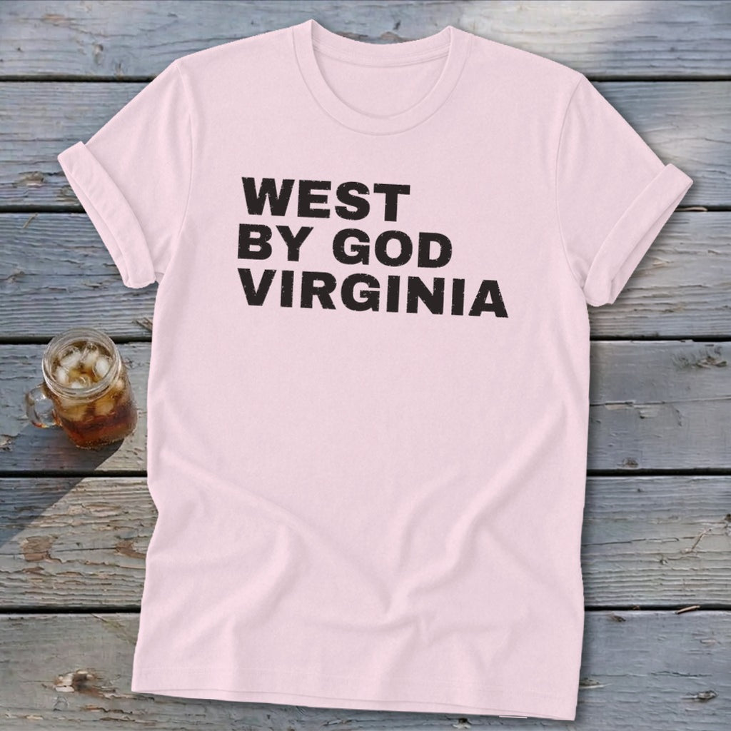 Pink t-shirt with black text "WEST BY GOD VIRGINIA" and a drink.
